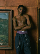 Load image into Gallery viewer, ANTi COUNTRY CLUB TOKYO 2026 SS - WHITE PIPING WARM-UP PANTS（NAVY) -
